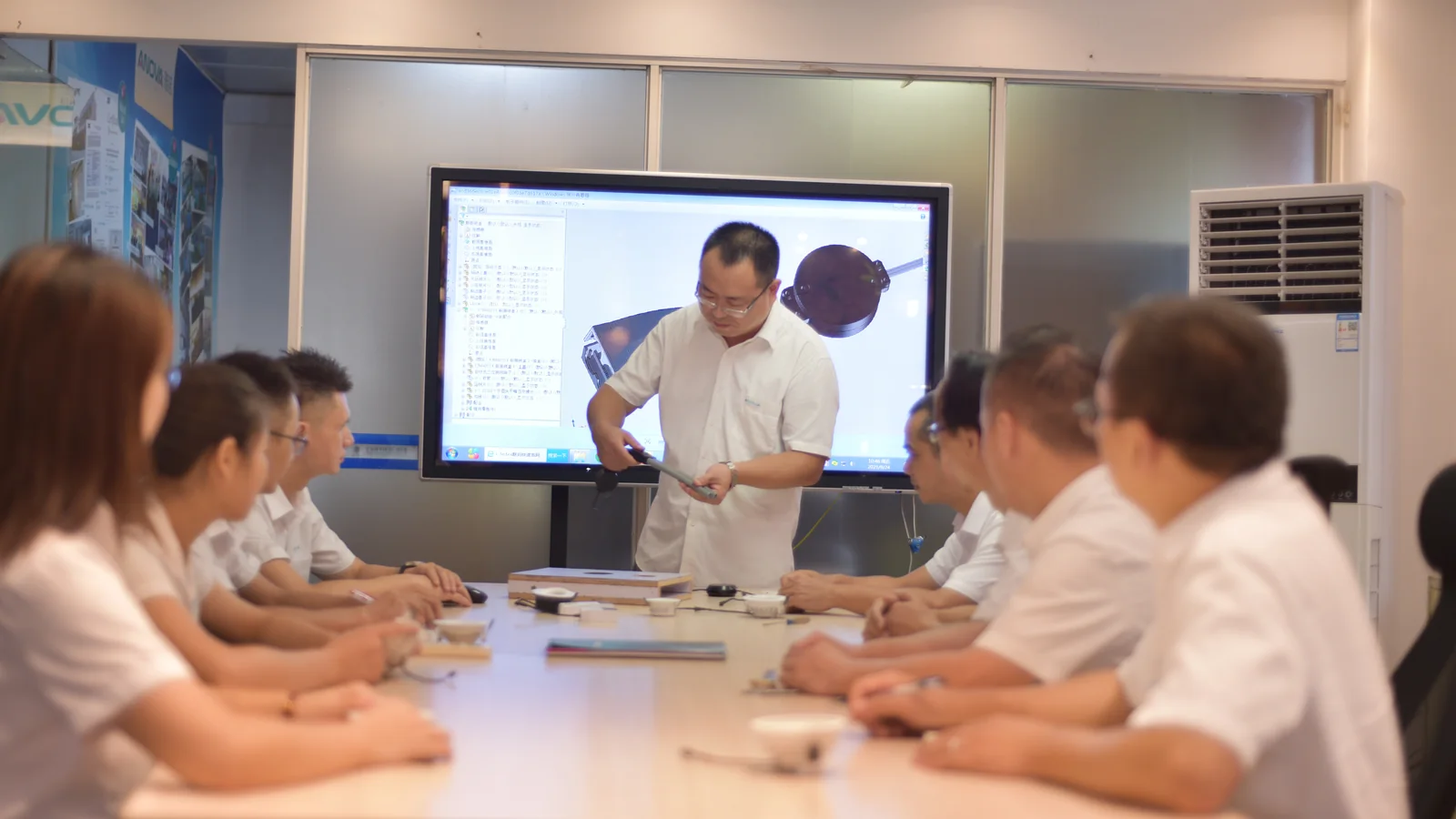 ANOVA team reviewing lighting product requirements in a project meeting